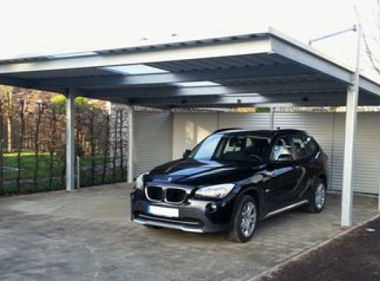Referenz D-21244 Buchholz, Carport, Pultdach, Trapezblech, Holz, Lichtband von Welcomp