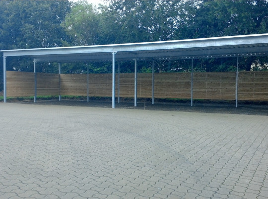Referenz D-31785 Hameln, Reihenanlage, Pultdach, Trapezblech, Holz von Welcomp