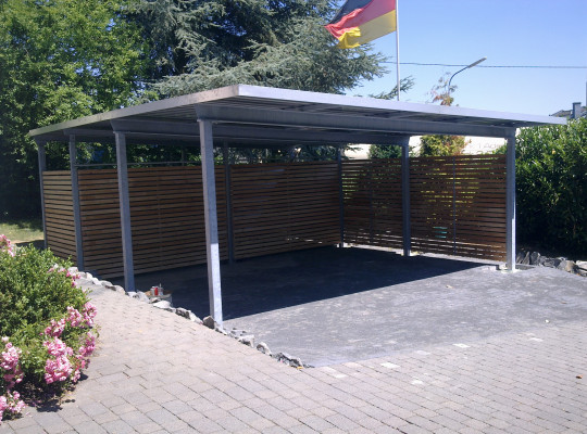 Referenz D-56235 Ransbach-Baumbach, Carport, Pultdach, Trapezblech, Holz von Welcomp