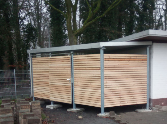 Referenz D-59302 Oelde-Stromberg, Mülltonnenhaus, Pultdach, Trapezblech, Holz von Welcomp