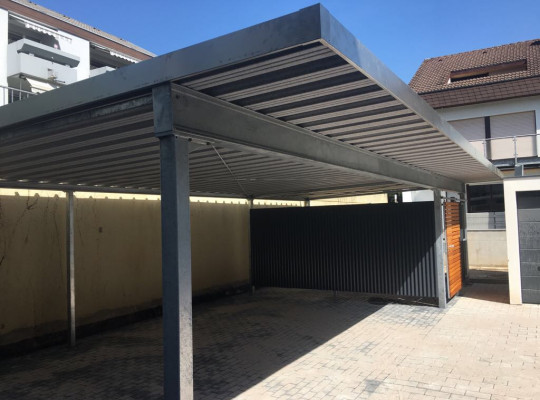 Referenz D-76351 Linkenheim-Hochstetten, Carport, Pultdach, Trapezblech, Holz von Welcomp